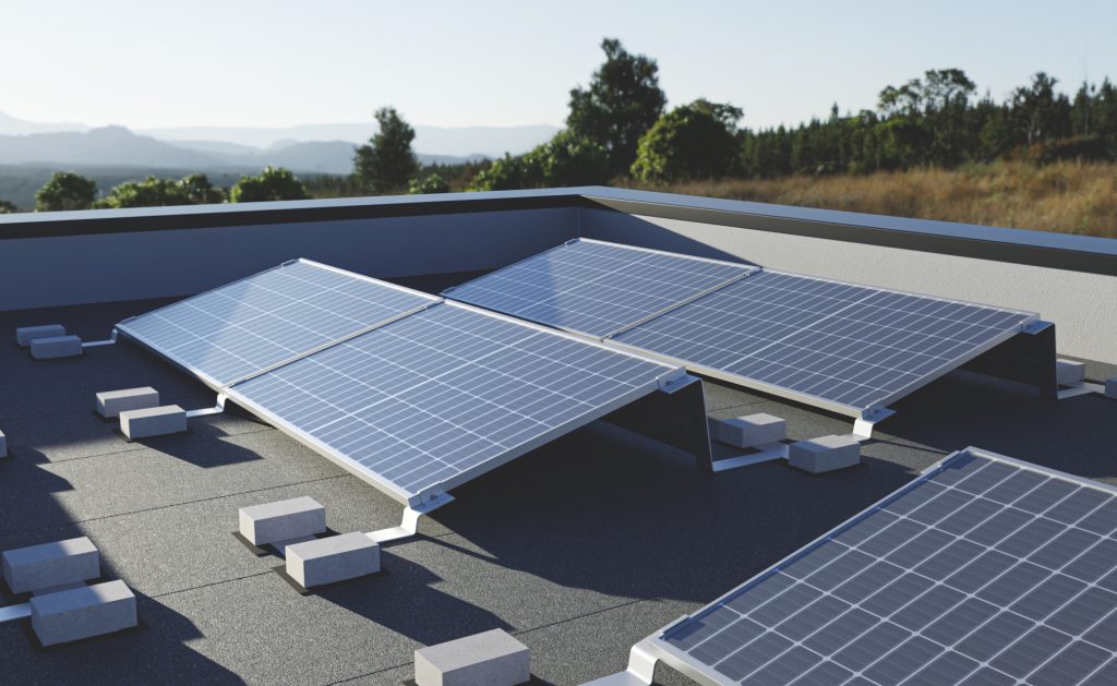 REKOSOL ballasted mounting system carrying solar modules on a flat commercial roof